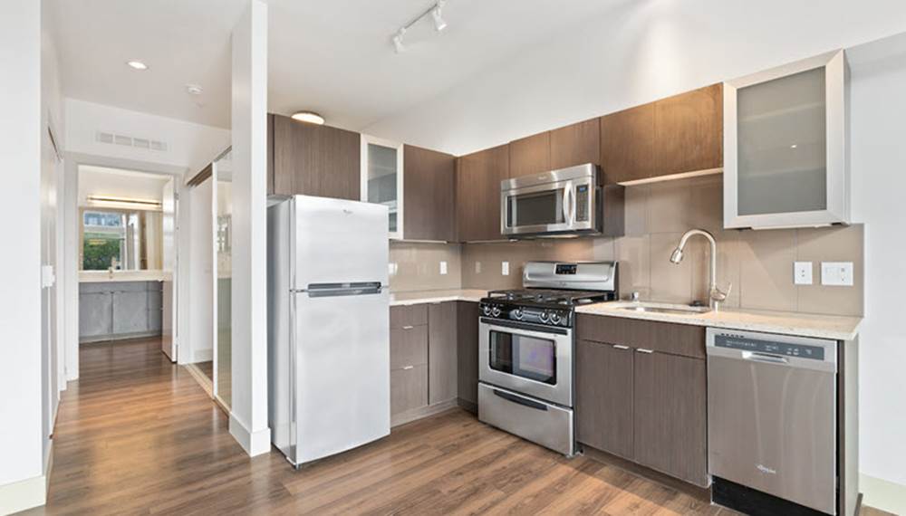 Collins on Pine Studio Full Kitchen with hardwood floors