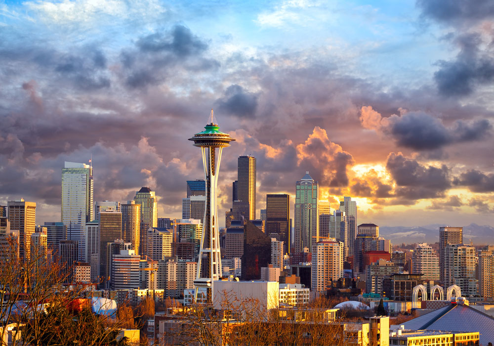 Cloudy Seattle, Washington skyline at sunset. 