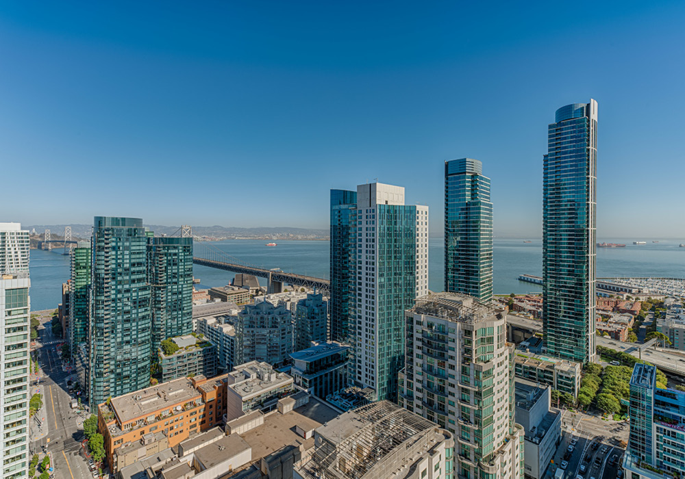 View of San Francisco buildings from a penthouse apartment.