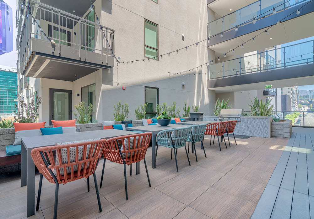 Outdoor community area with lounge seating at Wallace on Sunset.