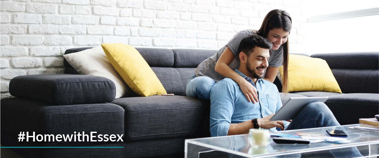 Home with Essex hero image of couple sitting on the couch