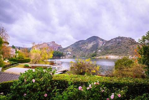 Garden with mountains in background.