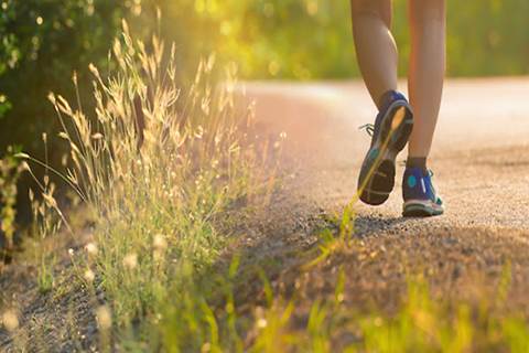 Person running outdoors in Vista, CA.