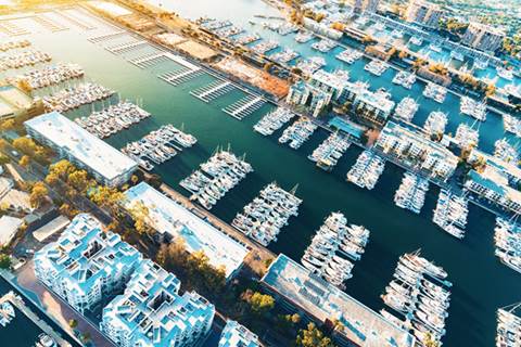 Aerial view of marina with boats.