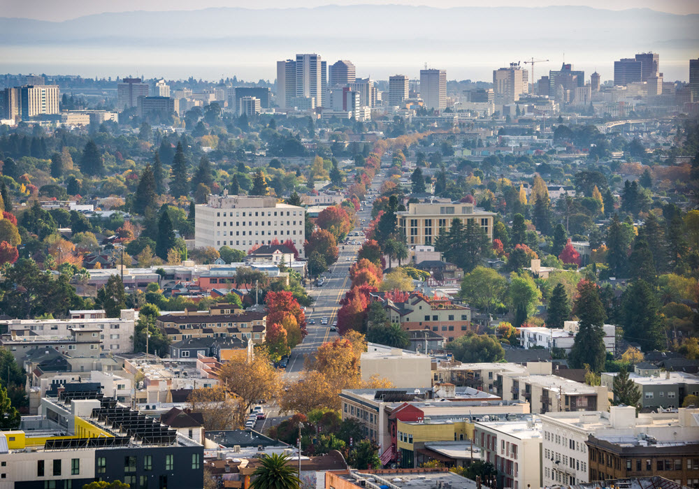 Aerial view of north Oakland with downtown Oakland in the background.